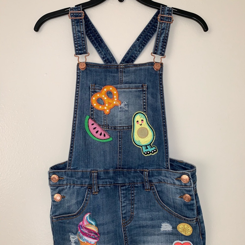 Girls patched up short overalls
